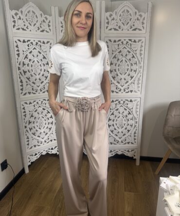 Spodnie eleganckie polski producent pasek z kwiatem .